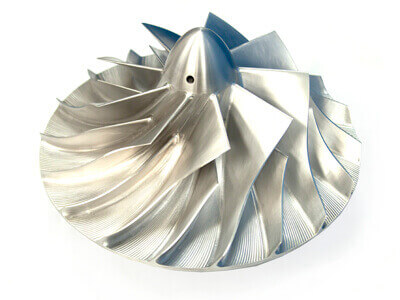 silver compressor wheel on white background